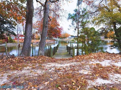 Welcome to Tee & Tide, a waterfront retreat where your days on Indian Creek Yacht and Country Club in Virginia - for sale on GolfHomes.com, golf home, golf lot
