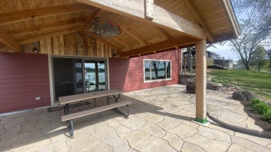 Welcome home to this beautiful, updated, unique charming rustic on Lakes of the Four Seasons Country Club in Indiana - for sale on GolfHomes.com, golf home, golf lot