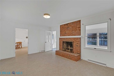 Welcome to Tee & Tide, a waterfront retreat where your days on Indian Creek Yacht and Country Club in Virginia - for sale on GolfHomes.com, golf home, golf lot