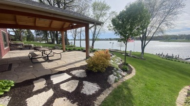 Welcome home to this beautiful, updated, unique charming rustic on Lakes of the Four Seasons Country Club in Indiana - for sale on GolfHomes.com, golf home, golf lot