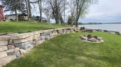 Welcome home to this beautiful, updated, unique charming rustic on Lakes of the Four Seasons Country Club in Indiana - for sale on GolfHomes.com, golf home, golf lot