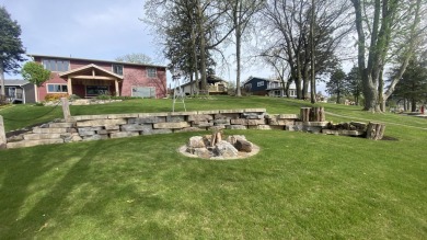 Welcome home to this beautiful, updated, unique charming rustic on Lakes of the Four Seasons Country Club in Indiana - for sale on GolfHomes.com, golf home, golf lot
