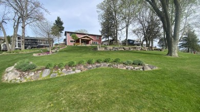 Welcome home to this beautiful, updated, unique charming rustic on Lakes of the Four Seasons Country Club in Indiana - for sale on GolfHomes.com, golf home, golf lot