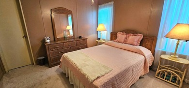 FURNISHED TURN KEY, OPEN BACKYARD Florida 2 bedroom 2 bath home on Zephyrhills Municipal Golf Course in Florida - for sale on GolfHomes.com, golf home, golf lot