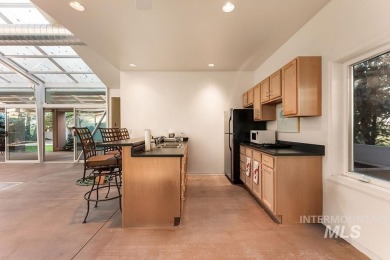 Surrounded by 300+ acres of rolling foothills, this legacy on Warm Springs Golf Club in Idaho - for sale on GolfHomes.com, golf home, golf lot