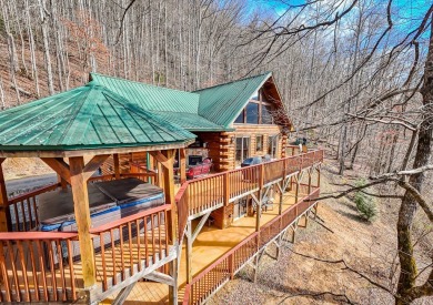 Charming Log Cabin Retreat in Bryson City -Nestled in the heart on Smoky Mountain Country Club in North Carolina - for sale on GolfHomes.com, golf home, golf lot