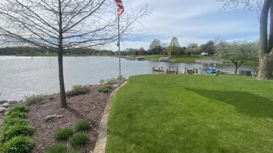 Welcome home to this beautiful, updated, unique charming rustic on Lakes of the Four Seasons Country Club in Indiana - for sale on GolfHomes.com, golf home, golf lot