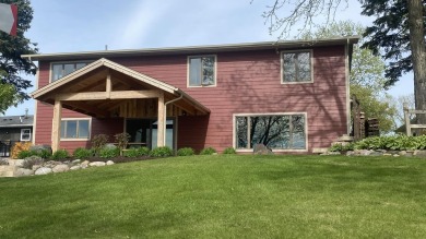 Welcome home to this beautiful, updated, unique charming rustic on Lakes of the Four Seasons Country Club in Indiana - for sale on GolfHomes.com, golf home, golf lot
