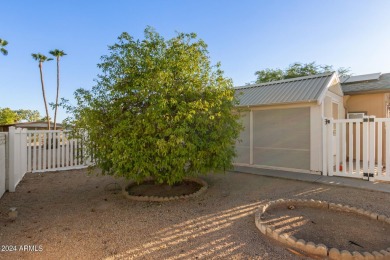 Extraordinarily upgraded 3 bed/2 bath on a large corner cul de on Sun Lakes Country Club in Arizona - for sale on GolfHomes.com, golf home, golf lot