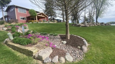 Welcome home to this beautiful, updated, unique charming rustic on Lakes of the Four Seasons Country Club in Indiana - for sale on GolfHomes.com, golf home, golf lot