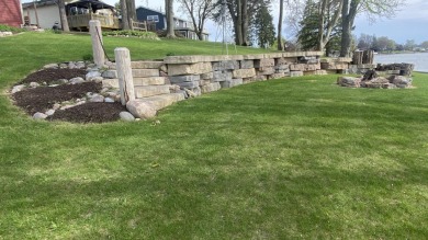 Welcome home to this beautiful, updated, unique charming rustic on Lakes of the Four Seasons Country Club in Indiana - for sale on GolfHomes.com, golf home, golf lot