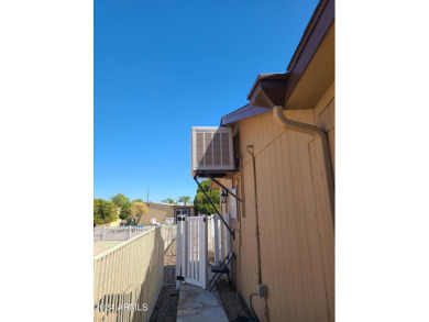 Extraordinarily upgraded 3 bed/2 bath on a large corner cul de on Sun Lakes Country Club in Arizona - for sale on GolfHomes.com, golf home, golf lot