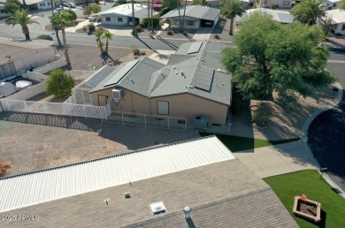 Extraordinarily upgraded 3 bed/2 bath on a large corner cul de on Sun Lakes Country Club in Arizona - for sale on GolfHomes.com, golf home, golf lot