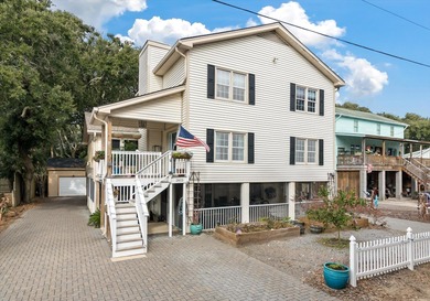 Just two blocks from the beach, this exceptional Isle of Palms on Wild Dunes Harbor Golf Resort in South Carolina - for sale on GolfHomes.com, golf home, golf lot