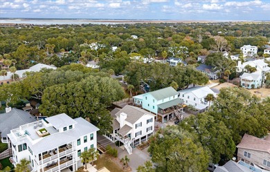 Just two blocks from the beach, this exceptional Isle of Palms on Wild Dunes Harbor Golf Resort in South Carolina - for sale on GolfHomes.com, golf home, golf lot
