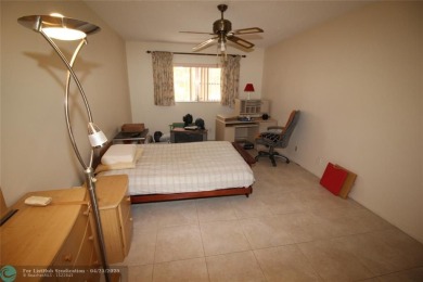 HANDYMAN SPECIAL. SPACIOUS 1BD/1.5BA WITH A BALCONY IN DESIRABLE on Oriole Golf and Tennis Club in Florida - for sale on GolfHomes.com, golf home, golf lot