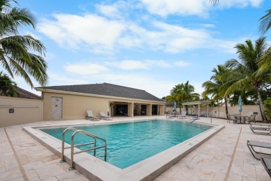 Step into this beautifully reimagined  WATERFRONT 2,368 sq. ft on Turtle Creek Club in Florida - for sale on GolfHomes.com, golf home, golf lot