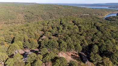 Sitting on three lots. This Immaculate 3-bedroom, 2-bath home on Mountain Ranch Golf Club in Arkansas - for sale on GolfHomes.com, golf home, golf lot