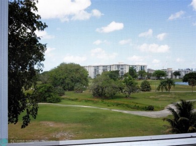 Spacious 2-Bed, 2-Bath Condo with Golf Course Views. Enjoy on Palm-Aire Country Club and Resort - Palms in Florida - for sale on GolfHomes.com, golf home, golf lot