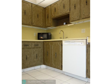 Spacious 2-Bed, 2-Bath Condo with Golf Course Views. Enjoy on Palm-Aire Country Club and Resort - Palms in Florida - for sale on GolfHomes.com, golf home, golf lot