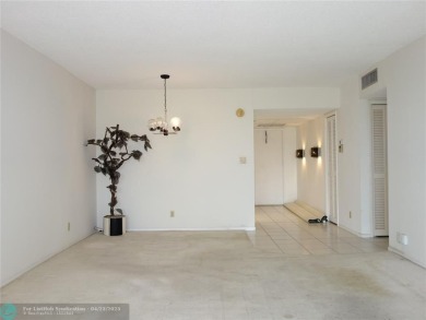 Spacious 2-Bed, 2-Bath Condo with Golf Course Views. Enjoy on Palm-Aire Country Club and Resort - Palms in Florida - for sale on GolfHomes.com, golf home, golf lot
