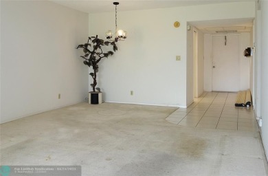Spacious 2-Bed, 2-Bath Condo with Golf Course Views. Enjoy on Palm-Aire Country Club and Resort - Palms in Florida - for sale on GolfHomes.com, golf home, golf lot