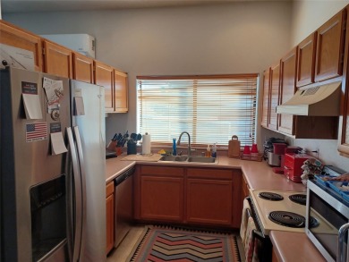 This very competitively priced 1500 square feet, 3 Bedroom, 2 on Santa Fe Country Club in New Mexico - for sale on GolfHomes.com, golf home, golf lot