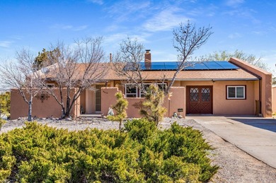 Lovely corner lot Pueblo-style home with large front and back on Pueblo de Cochiti Golf Course in New Mexico - for sale on GolfHomes.com, golf home, golf lot