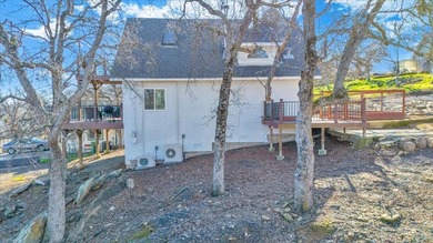 Enjoy 180-degree views of Copperopolis and Lake Tulloch from on The Club at Copper Valley Golf Course in California - for sale on GolfHomes.com, golf home, golf lot