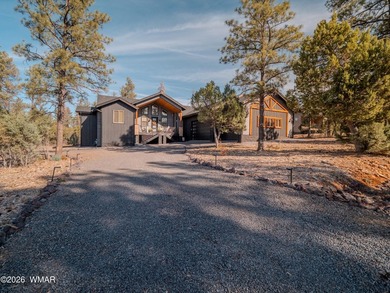 Nestled among the tall pines of the prestigious Torreon Golf on Torreon Golf Club in Arizona - for sale on GolfHomes.com, golf home, golf lot