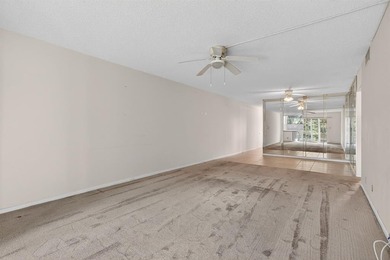 **SALE OF THE CENTURY IN VIBRANT & HIGHLY SOUGHT AFTER WYNMOOR on Wynmoor Golf Course in Florida - for sale on GolfHomes.com, golf home, golf lot