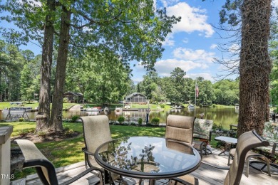 The Ultimate Waterfront Getaway awaits you at in a gated lake on River Golf and County Club at Lake Royale in North Carolina - for sale on GolfHomes.com, golf home, golf lot