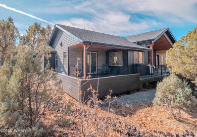 Nestled among the tall pines of the prestigious Torreon Golf on Torreon Golf Club in Arizona - for sale on GolfHomes.com, golf home, golf lot