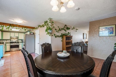 Lovely corner lot Pueblo-style home with large front and back on Pueblo de Cochiti Golf Course in New Mexico - for sale on GolfHomes.com, golf home, golf lot