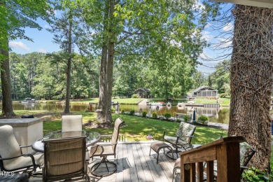 The Ultimate Waterfront Getaway awaits you at in a gated lake on River Golf and County Club at Lake Royale in North Carolina - for sale on GolfHomes.com, golf home, golf lot