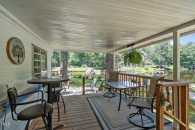The Ultimate Waterfront Getaway awaits you at in a gated lake on River Golf and County Club at Lake Royale in North Carolina - for sale on GolfHomes.com, golf home, golf lot