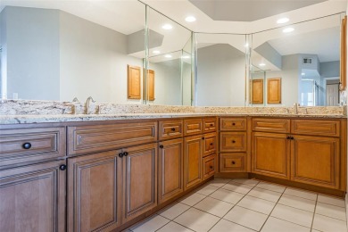 Move-in ready and beautifully remodeled 3 bedroom plus on Seminole Lake Country Club in Florida - for sale on GolfHomes.com, golf home, golf lot