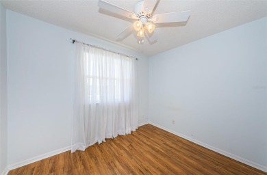 Move-in ready and beautifully remodeled 3 bedroom plus on Seminole Lake Country Club in Florida - for sale on GolfHomes.com, golf home, golf lot