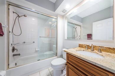 Move-in ready and beautifully remodeled 3 bedroom plus on Seminole Lake Country Club in Florida - for sale on GolfHomes.com, golf home, golf lot