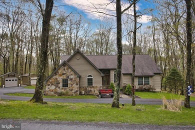 Tucked on a beautiful wooded 0.68 acre lot is this charming on Alpine Lake Resort in West Virginia - for sale on GolfHomes.com, golf home, golf lot
