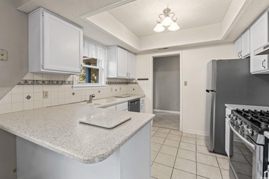 Discover coastal living at its best in the highly sought-after on Heron Point Golf Club in South Carolina - for sale on GolfHomes.com, golf home, golf lot