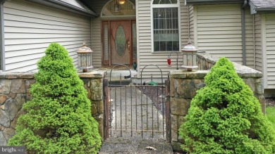 Tucked on a beautiful wooded 0.68 acre lot is this charming on Alpine Lake Resort in West Virginia - for sale on GolfHomes.com, golf home, golf lot