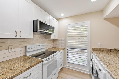 Beautifully Renovated Golf Villa in PGA National.Discover this on PGA National Golf Club in Florida - for sale on GolfHomes.com, golf home, golf lot