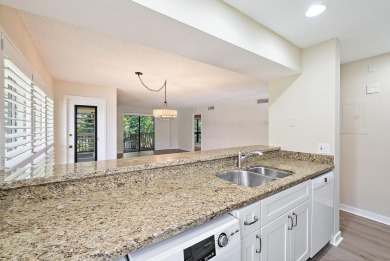 Beautifully Renovated Golf Villa in PGA National.Discover this on PGA National Golf Club in Florida - for sale on GolfHomes.com, golf home, golf lot