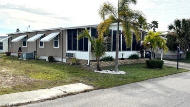 This charming single family home boasts 2 bedrooms and 2 on Riverbend Golf and Country Club in Florida - for sale on GolfHomes.com, golf home, golf lot