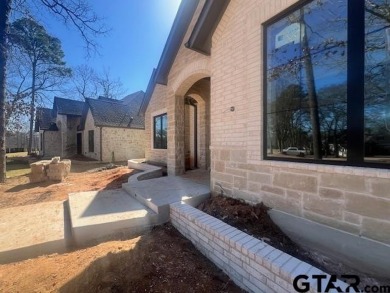 Luxury home built by A&B Custom Homes in the gated golf course on Eagles Bluff Golf Course in Texas - for sale on GolfHomes.com, golf home, golf lot