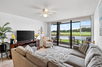 Beautifully furnished first-floor condo with stunning lake and on Bear Lakes Country Club in Florida - for sale on GolfHomes.com, golf home, golf lot