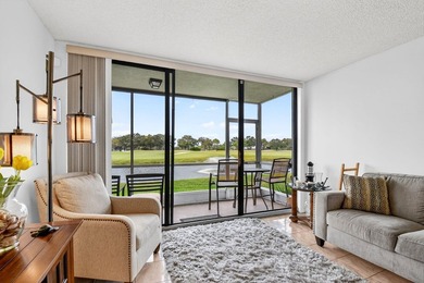 Beautiful first-floor condo with stunning lake and golf course on Bear Lakes Country Club in Florida - for sale on GolfHomes.com, golf home, golf lot