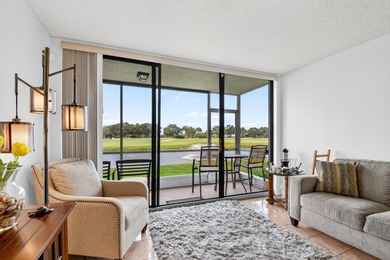 Beautifully furnished first-floor condo with stunning lake and on Bear Lakes Country Club in Florida - for sale on GolfHomes.com, golf home, golf lot
