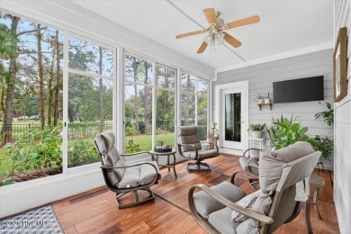 This beautifully maintained home sits directly on the golf on Beau Rivage Golf and Resort in North Carolina - for sale on GolfHomes.com, golf home, golf lot